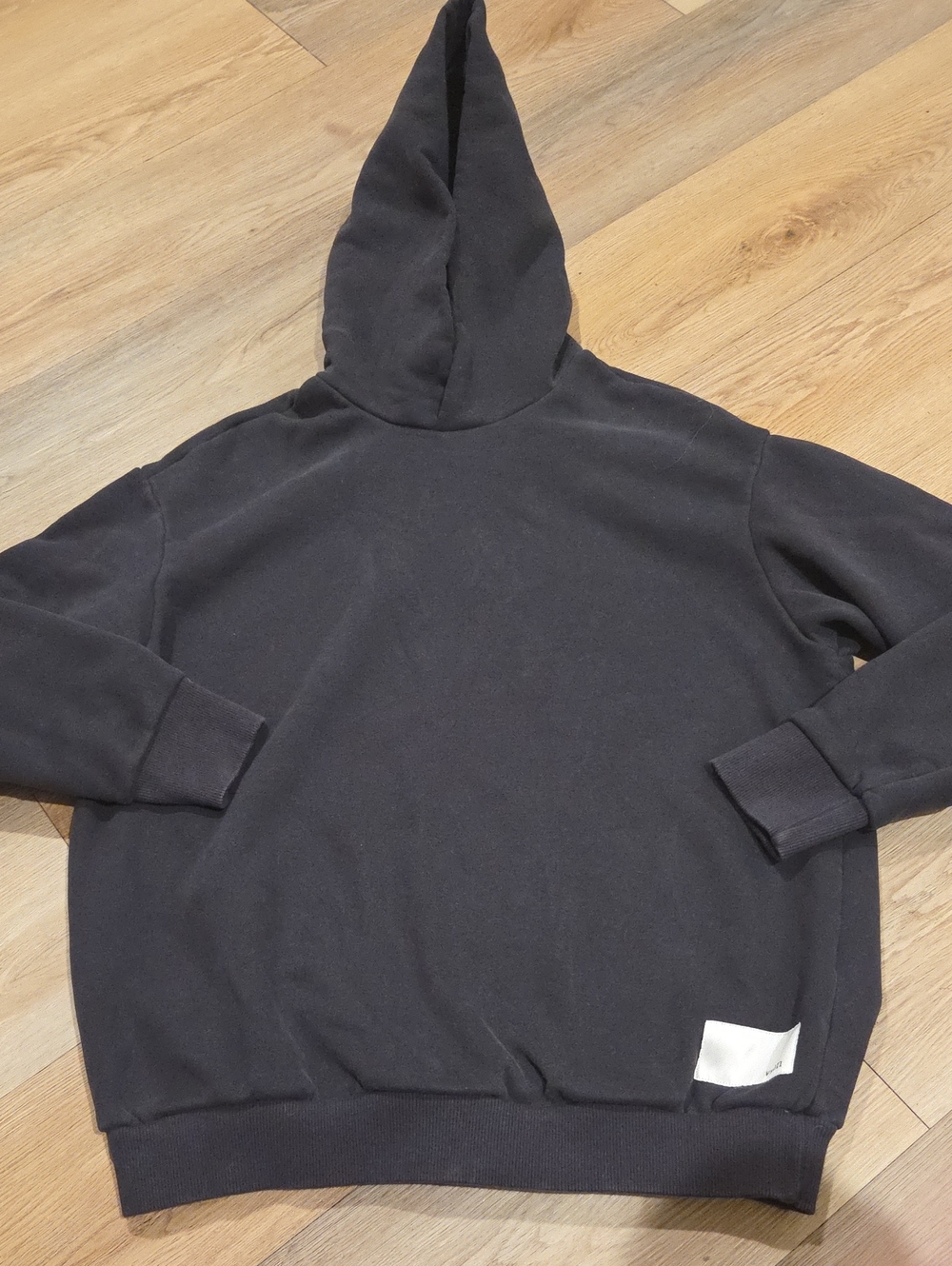 Vuori Black Men's Hooded Pullover with White Logo Patch